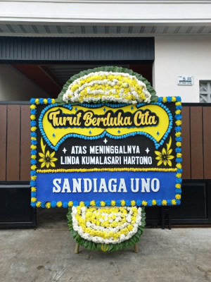 Papan Bunga Duka di Tinggi Raja